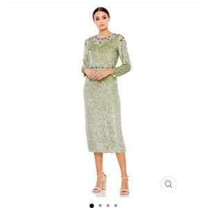 Macduggal dress, available in 10, 16